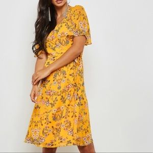 Lumiere mustard yellow floral wrap dress